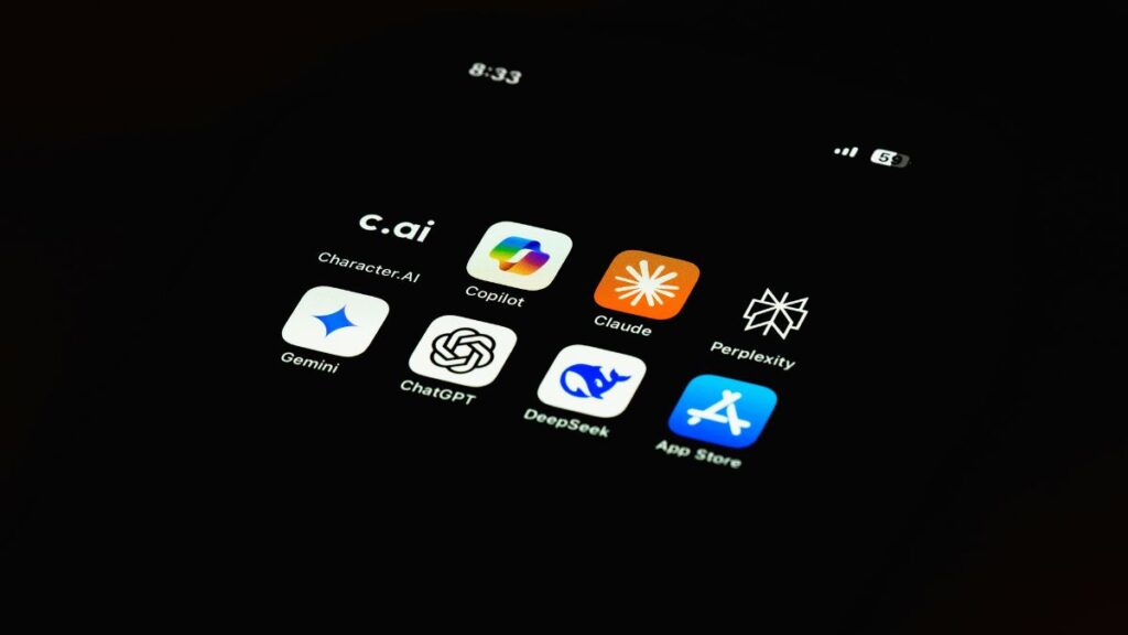 Smartphone screen displaying icons of leading generative AI apps for content creation, including Character.AI, ChatGPT, Gemini, Copilot, Claude, Perplexity, and DeepSeek, representing tools for modern digital creators.